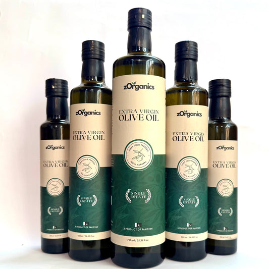 Bottles of premium extra virgin olive oil from zOrganics